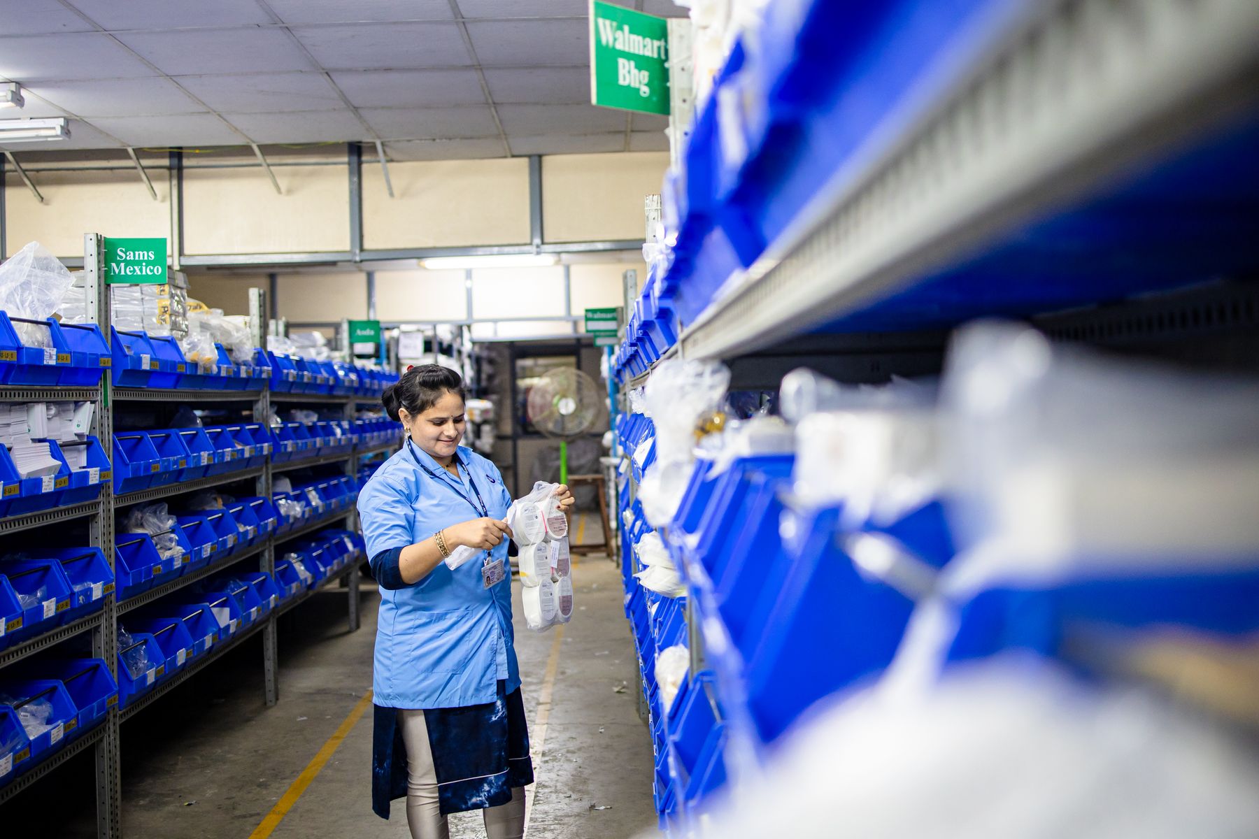 Indian warehouse worker preparing a shipment