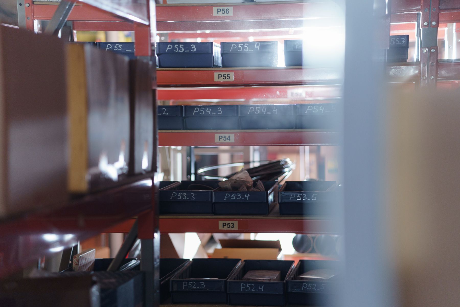 Warehouse shelves with labelled stock